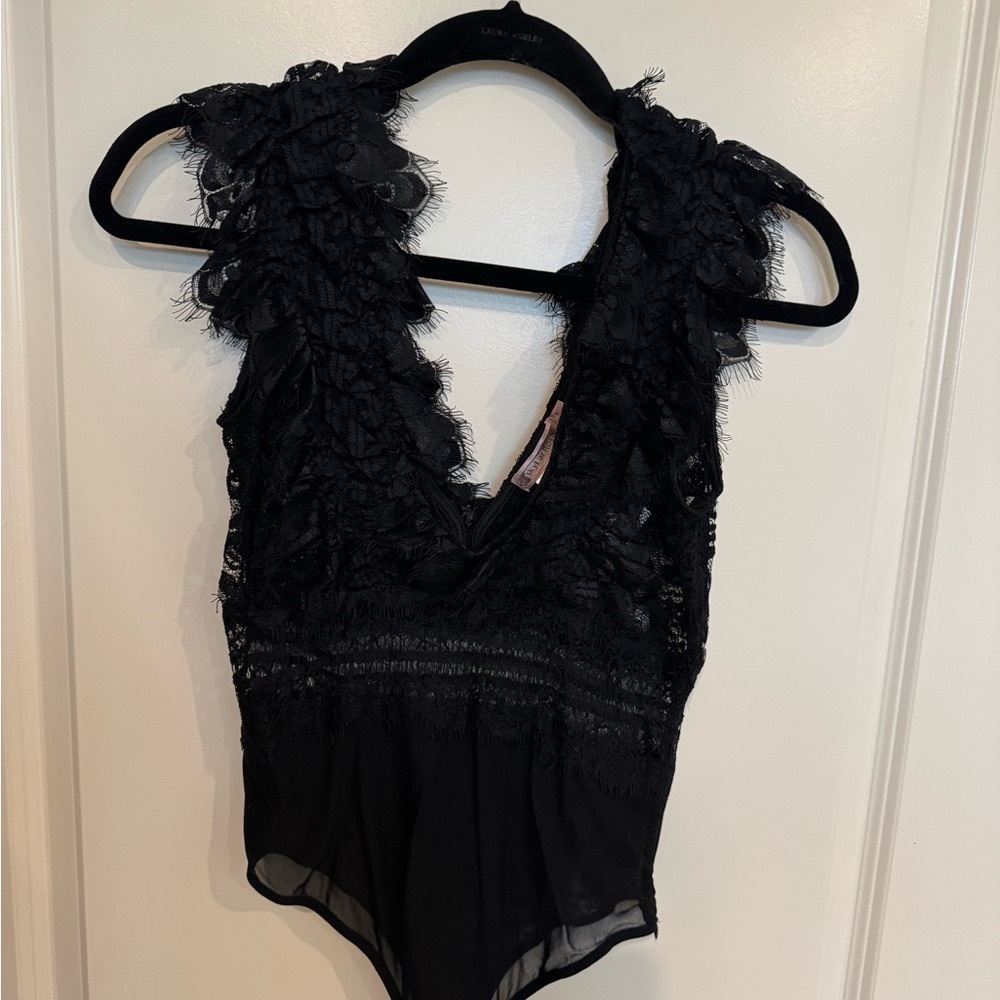 New, lace, ruffled bodysuit, black.